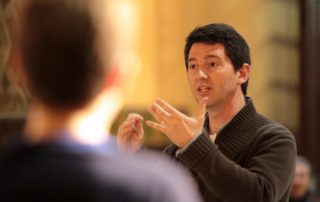 Bernat conducting a children's choir
